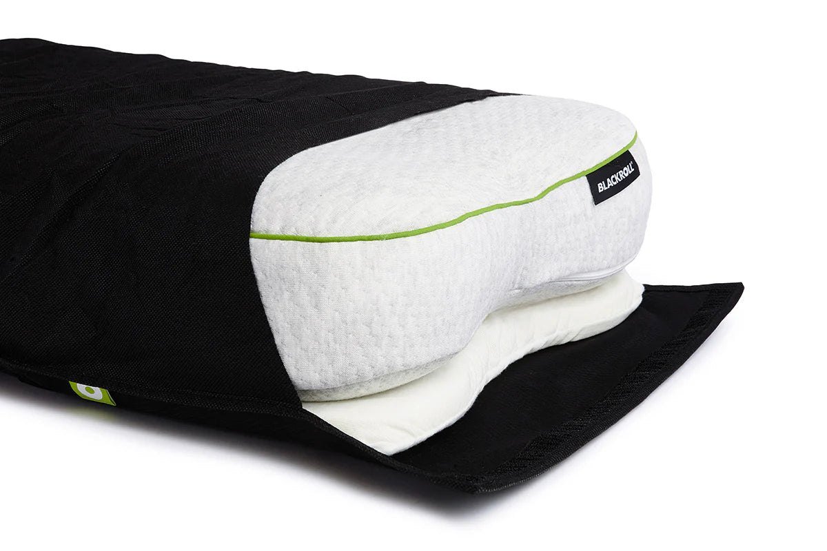 Pillow partially packed into travel sleeve