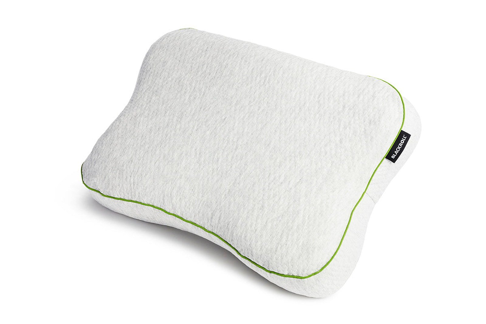 Close detail of pillow fabric texture and green piping